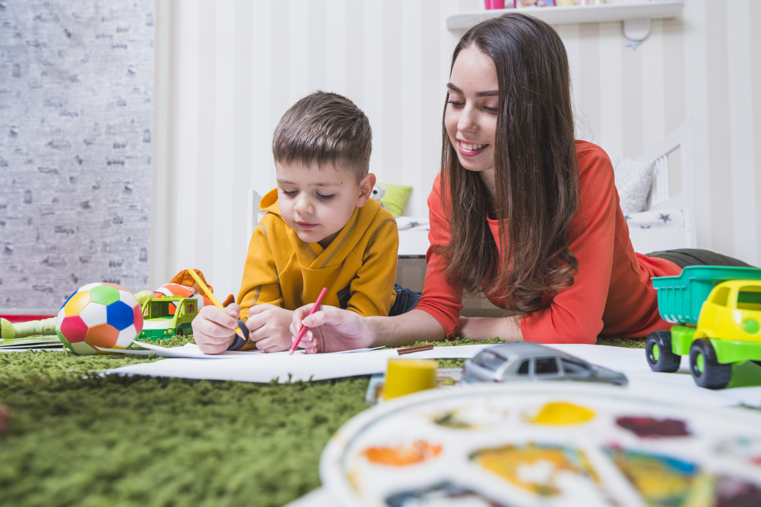 diverse-children-enjoying-playing-toys-600nw-1247691913 how to pick a good daycare